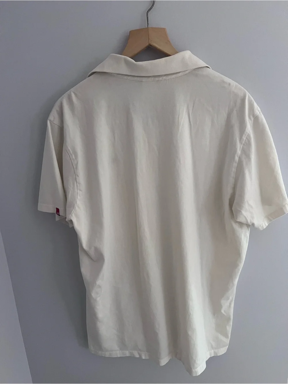 The North Face Men's off white/ cream colored Polo with Red Collar Trim